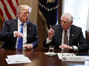 President Donald Trump speaks with Rep. Steny Hoyer, D-Md., during a meeting with lawmakers on immigration policy, Tuesday, Jan. 9, 2018, in Washington.