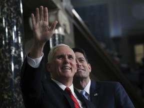 Vice President Mike Pence, left, and Speaker of the House Paul Ryan of Wis., attend the State of the Union address in the chamber of the U.S. House of Representatives Tuesday, Jan. 30, 2018, in Washington.