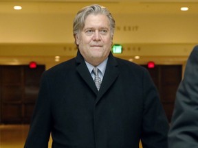 Former White House strategist Steve Bannon leaves a House Intelligence Committee meeting where he was interviewed behind closed doors on Capitol Hill, Tuesday, Jan. 16, 2018, in Washington.