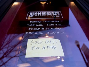 Sign posted at the door for Kramerbooks & Afterwords Cafe indicating that the book "Fire and Fury: Inside the Trump White House" is sold out at the bookstore located in the Dupont Circle neighborhood in Washington, Friday, Jan. 5, 2018.