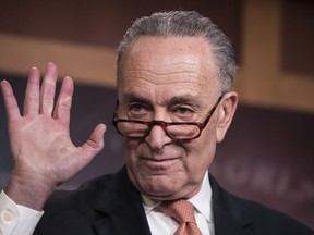 Senate Minority Leader Chuck Schumer, D-N.Y., explains to reporters how his negotiations with President Donald Trump broke down yesterday as quarreling politicians in Washington eventually failed to keep their government in business, at the Capitol in Washington, Saturday, Jan. 20, 2018.