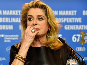 French actress Catherine Deneuve attends a press conference on February 14, 2017, for the film "Sage Femme" (The Midwife at the 67th Berlinale film festival in Berlin.