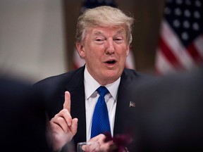 U.S. President Donald attends a working dinner with European business leaders during the World Economic Forum in Davos, Switzerland, on Jan. 25, 2018.