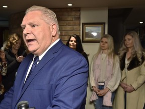 Former Toronto city councillor Doug Ford holds a news conference in Toronto, Monday, Jan.29, 2018 as family members look on. Ford announced his intention to run for leader of the Ontario Conservative party.