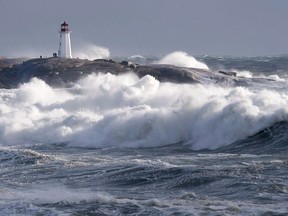 Waves pound the shore at Peggy's Cove, N.S. on Friday, Jan. 5, 2018.