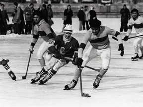 Students reenact the 1886 hockey game between Queen's and RMC in Kingston, Ont., in 1980.