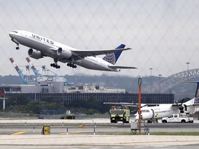 In this July 25, 2013, file photo, a United Airlines plane takes off from Newark Liberty International Airport, in Newark, N.J.