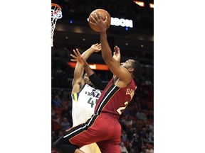 Miami Heat guard Wayne Ellington (2) goes to the basket against Utah Jazz guard Donovan Mitchell (45) during the first half of an NBA basketball game, Sunday, Jan. 7, 2018, in Miami.