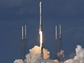 A SpaceX Falcon 9 rocket lifts off from Complex 41 at Cape Canaveral Air Force Station Wednesday, afternoon, Jan. 31, 2018. The rocket is carrying a communications satellite for the satellite company SES and the government of Luxembourg.