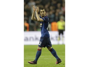 FILE - In this May 24, 2017 file photo Manchester's Henrikh Mkhitaryan leaves the pitch during the soccer Europa League final between Ajax Amsterdam and Manchester United at the Friends Arena in Stockholm, Sweden. Mkhitaryan has been left out of Manchester United's squad for its Premier League game against Burnley on Saturday while negotiations continue over a potential swap deal involving him and Arsenal forward Alexis Sanchez.