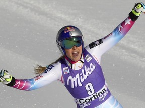 United States' Lindsey Vonn gets to the finish area after winning an alpine ski, women's World Cup downhill, in Cortina D'Ampezzo, Italy, Saturday, Jan. 20, 2018.