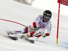 Switzerland's Lara Gut speeds down the course during an alpine ski, women's World Cup super-G, in Cortina D'Ampezzo, Italy, Sunday Jan. 21, 2018.