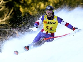 United States' Nolan Kasper speeds down the course during an alpine ski, men's World Cup slalom in Wengen, Switzerland, Sunday, Jan. 14, 2018.
