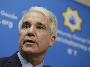 FILE - In this Dec. 9, 2014 file photo, San Francisco District Attorney George Gascon speaks during a news conference in San Francisco. San Francisco's district attorney says his office will toss out or reduce thousands of marijuana criminal convictions dating back decades, which a 2016 ballot measure legalizing recreational use of the drug in California allows. Gascon announced Wednesday, Jan. 31, 2018, that his office will review nearly 5,000 felony cases for possible action and automatically seal 3,000 misdemeanor cases.