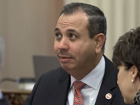 FILE - In this Aug. 26, 2016, file photo, state Sen. Tony Mendoza, D-Artesia, listens at the Capitol in Sacramento, Calif. Eyes are on the California Senate's handling of sexual misconduct allegations against one of its members as lawmakers return to Sacramento for the new year. Mendoza is resisting pressure to step aside amid an investigation into allegations of misconduct toward young women who worked for him.