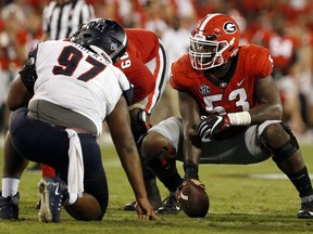 FILE - In this Sept. 16, 2017, file photo, Georgia center Lamont Gaillard (53) gets ready to run a play in the second half NCAA college football game against Samford in Athens, Ga. Gaillard is a 301-pound fourth-year junior who gives Georgia a chance to move Alabama nose guard Da'Ron Payne one-on-one, but he will probably need some help.