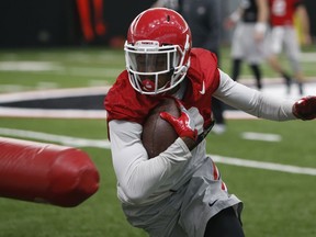 Georgia wide receiver Jayson Stanley runs a drill during the team's practice Saturday, Jan. 6, 2018, in Athens, Ga., for Monday's NCAA championship football game against Alabama in Atlanta.