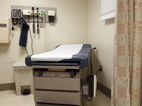 A file photo of an examination table in a doctor's office.