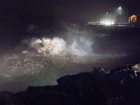 Waves pound the shore in Eastern Passage, N.S. on Thursday, Jan. 4, 2018. Environment Canada has issued winter storm warnings and watches for Nova Scotia, New Brunswick, P.E.I. and parts of Newfoundland and Labrador, as a low-pressure system brings fierce winds, rain and heavy snow in places.