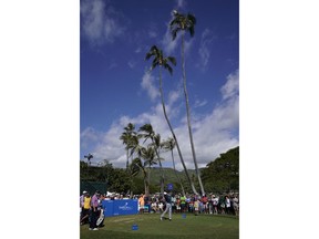 Jordan Spieth tees off on the 11th tee during the third round of the Sony Open golf tournament, Saturday Jan. 13, 2018, in Honolulu.