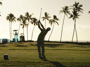 Zach Johnson hits off the 11th tee during the second round of the Sony Open golf tournament, Friday, Jan. 12, 2018, in Honolulu.