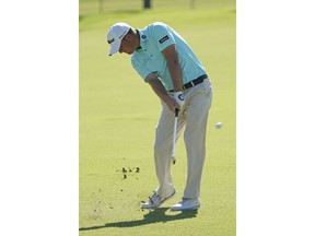 Tom Hoge hits his ball off the first fairway during the second round of the Sony Open golf tournament, Friday, Jan. 12, 2018, in Honolulu.