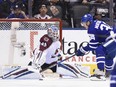 Colorado Avalanche goaltender Jonathan Bernier makes a save on Toronto Maple Leafs centre Auston Matthews during the first period in Toronto on Monday.