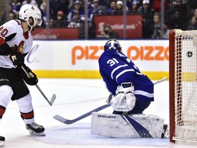 Ottawa Senators left wing Tom Pyatt scores against Toronto Maple Leafs goaltender Frederik Andersen during the third period in Toronto on Wednesday.