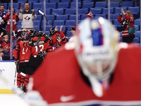 Canadian players celebrate a goal against the Czech Republic at the world juniors on Jan. 4.