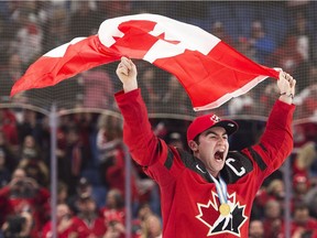 Captain Dillon Dube celebrates Canada's win in the world junior final against Sweden on Jan. 5.