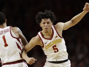 Iowa State guard Lindell Wigginton (5) celebrates with teammate Nick Weiler-Babb (1) after making a 3-point basket during the first half of an NCAA college basketball game against Baylor, Saturday, Jan. 13, 2018, in Ames, Iowa.