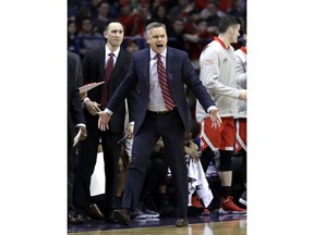 Ohio State head coach Chris Holtmann yells his team during the second half of an NCAA college basketball game against Northwestern Wednesday, Jan. 17, 2018, in Rosemont, Ill. Ohio State won 71-65.