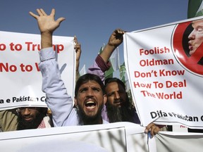 Supporters of Pakistani religious groups rally to condemn a tweet by U.S. President Donald Trump in Karachi, Pakistan, Tuesday, Jan. 2, 2018. Trump slammed Pakistan for 'lies & deceit' in a New Year's Day tweet that said Islamabad had played U.S. leaders for 'fools'. 'No more,' Trump tweeted.
