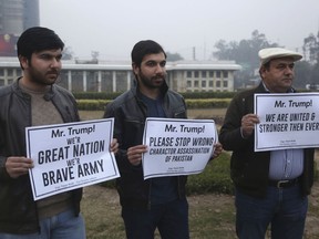 In this Jan. 4, 2018 photo, Pakistanis activists of civil society protest against U.S. President Donald Trump in Lahore, Pakistan. A senior Pakistani senator has expressed disappointment at the U.S. decision to suspend military aid to Islamabad, saying it will be detrimental to Pakistani-U.S. relations. Nuzhat Sadiq, the chairwoman of the Senate Foreign Affairs committee in the upper house of parliament, says Islamabad can manage without the United States as it did in the 1990s, but would prefer to move the troubled relationship forward.
