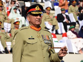 FILE -- In this Nov. 29, 2016 file photo released by Inter Services Public Relations, the public relations arm of the Pakistani army, Pakistani Army Chief Gen. Qamar Javed Bajwa attends the Change of Command ceremony in Rawalpindi, Pakistan. Bajwa says he received a phone call from the head of U.S. Central Command, Gen. Joseph Vogel, offering assurances that the United States would not unilaterally hit targets inside Pakistan. (Inter Services Public Relations via AP)