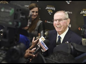 Tom Coughlin talks with reporters at the press conference where he was introduced as the Jacksonville Jaguars executive vice-president of football operations 53 weeks ago.