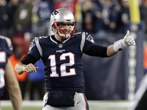 New England Patriots quarterback Tom Brady reacts during the second half of the AFC championship NFL football game against the Jacksonville Jaguars, Sunday, Jan. 21, 2018, in Foxborough, Mass.