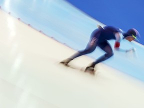 In this picture taken with a long time exposure winner Sverre Lunde Pedersen of Norway competes during the men's 5,000 meters distance at the Speed Skating World Cup in Erfurt, central Germany, Saturday, Jan. 20, 2018.