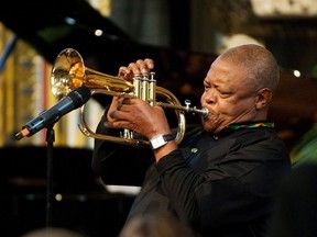 FILE - In this March 2012 file photo, South African jazz musician Hugh Masekela performs during the Observance for Commonwealth Day service at Westminster Abbey in central London. A family statement issued on Twitter Tuesday Jan. 23, 2018, says South African jazz musician and anti-apartheid activist Hugh Masekela, 78, passed away in Johannesburg after a lengthy battle against prostate cancer.