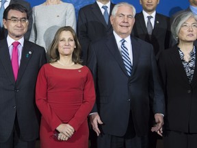 Minister of Foreign Affairs, Chrystia Freeland, centre, poses for a photo with Japan's Foreign Affairs Minister, Taro Kono, left, Secretary of State of the United States, Rex Tillerson, second from right, and Korea's Foreign Affairs Minister Kang Kyung-wha, right, along with other Ministers during a meeting on the Security and Stability on the Korean Peninsula in Vancouver, B.C., Tuesday, Jan. 16, 2018.