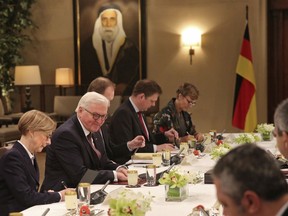 German President Frank-Walter Steinmeier, second left, meets with King Abdullah II of Jordan and their delegations in Amman, Jordan, Sunday, Jan. 28, 2018. The king  raised with Steinmeier the case of Jerusalem in the wake of the U.S. decision to declare the city the capital of Israel. Steinmeier said "we have many things to talk about" like Jerusalem, tension between Saudi Arabia and Iran, and refugees.