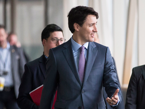 Prime Minister Justin Trudeau arrives for a Liberal party Cabinet retreat in London, Ontario on Thursday, Jan. 11, 2018.