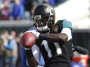 Jacksonville Jaguars wide receiver Marqise Lee warms up before an NFL wild-card playoff football game against the Buffalo Bills, Sunday, Jan. 7, 2018, in Jacksonville, Fla.