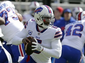 Buffalo Bills quarterback Tyrod Taylor looks for a receiver in the first half of an NFL wild-card playoff football game against the Jacksonville Jaguars, Sunday, Jan. 7, 2018, in Jacksonville, Fla.