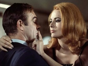A still image of Karin Dor as Number 11 from 'You Only Live Twice,' alongside Sean Connery.