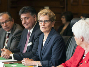 Ontario Premier Kathleen Wynne holds the first cabinet meeting after announcing a cabinet shuffle in 2016. Several of her ministers have stated they won’t be running in the 2018 Ontario election.