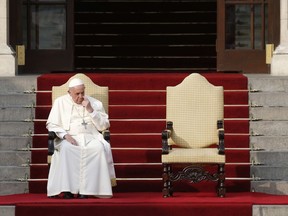 Pope Francis listens to the speech by Peru's President Pedro Pablo Kuczynski at the government palace in Lima, Peru, Friday, Jan. 19, 2018.