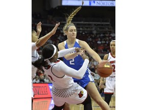 Duke guard Haley Gorecki (2) charges into Louisville forward Myisha Hines-Allen (2) during the first half of an NCAA college basketball game, Thursday, Jan. 4, 2018, in Louisville, Ky.