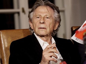 FILE - In this Oct. 30, 2015, file photo, filmmaker Roman Polanski tells reporters he can "breath with relief" after a Polish judge ruled that the law forbids his extradition to the U.S., where in 1977 he pleaded guilty to having sex with a minor, in Krakow, Poland. Los Angeles prosecutors will not bring criminal charges against Oscar-winning director Polanski after a woman said he molested her in 1975, when she was 10 years old, because the allegations are too old.