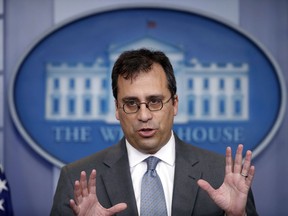 FILE - In this Dec. 12, 2017 file photo United States Citizenship and Immigration Services (USCIS) Director L. Francis Cissna speaks during the daily press briefing at the White House in Washington. Cissna, said on a visit to Los Angeles in December that he hoped to stem the growing backlog in asylum applications to prevent fraud and enable those truly fleeing persecution to settle here. On Wednesday, Jan. 31, 2018, the agency announced plans to start reviewing newer asylum applications first and pushing those already waiting years toward the back of the line.